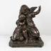 Estatua de niño y ángel en cobre fundido