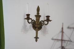 Apliqué de bronce