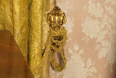 Soporte para lazo de cortina